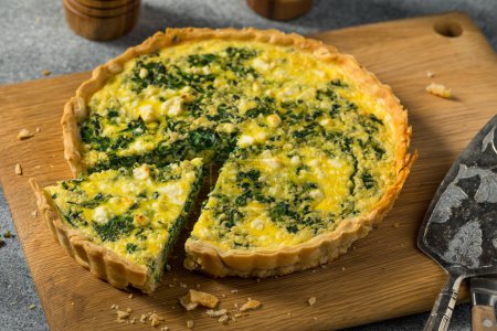 Photo for Homemade Feta Spinach Quiche Tart with Eggs and Onion - Royalty Free Image