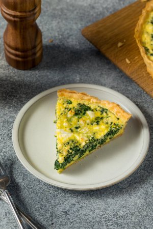 Photo for Homemade Feta Spinach Quiche Tart with Eggs and Onion - Royalty Free Image