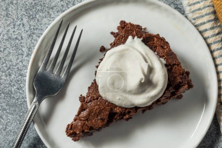 Foto de Hearty Gluten Free Flourless Chocolate Cake with Whipped Cream - Imagen libre de derechos