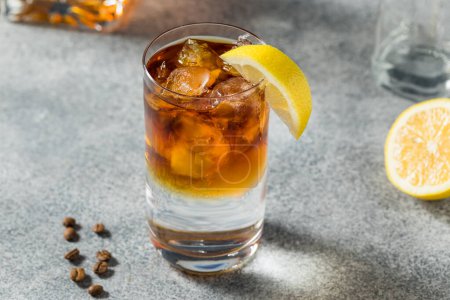 Photo for Boozy Cold Bourbon Quick Start Cocktail with Tonic and Coffee - Royalty Free Image