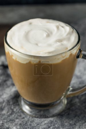 Photo for Boozy Refreshing Irish Coffee Cocktail with Whipped Cream - Royalty Free Image