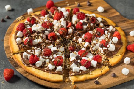 Photo for Homemade Sweet Chocolate Hazelnut Pizza Pastry with Marshmallows and Raspberries - Royalty Free Image