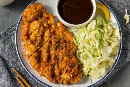 Photo for Homemade Japanese Chicken Katsu with Cabbage and Tonkatsu Sauce - Royalty Free Image