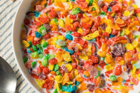 Photo for Sweet Sugary Fruity Breakfast Cereal with MIlk and Juice - Royalty Free Image