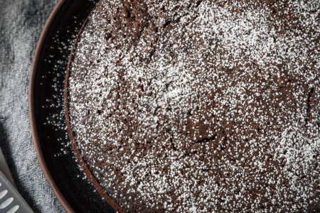 Photo for Baked Chocolate Olive Oil Cake with Powdered Sugar - Royalty Free Image