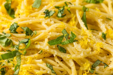 Photo for Healthy Homemade Italian Lemon Pasta with Cheese and Basil - Royalty Free Image