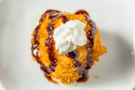 Photo for Homemade Fried IceCream Dessert with Chocolate and Whipped Cream - Royalty Free Image