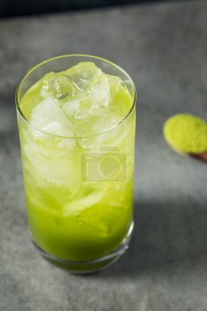 Photo for Refreshing Cold Matcha Soda Cocktail with Simple Syrup - Royalty Free Image