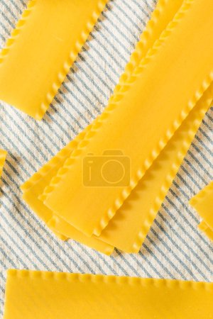 Photo for Raw Dry Organic Lasagna Noodles Ready to Cook - Royalty Free Image