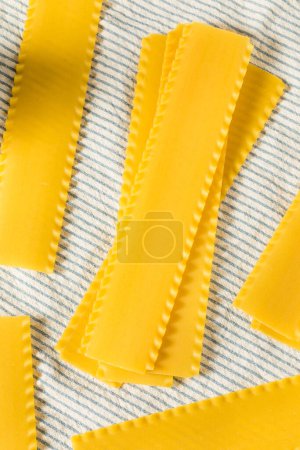 Photo for Raw Dry Organic Lasagna Noodles Ready to Cook - Royalty Free Image