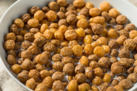 Photo for Sweet Chocolate Peanut Butter Breakfast Cereal with Milk - Royalty Free Image