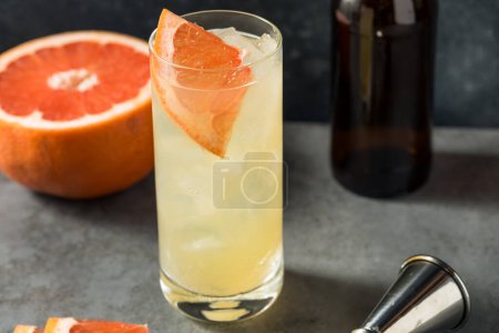 Photo for Cold Boozy Grapefruit Gin Radler in a Glass - Royalty Free Image