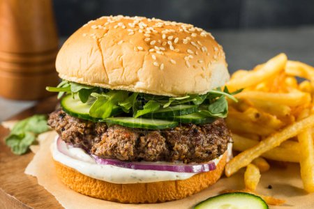 Photo for Homemade Healthy Lamb Burger with French Fries - Royalty Free Image