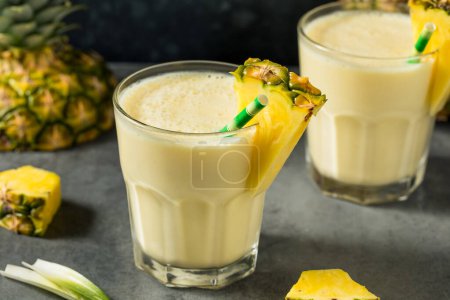 Photo for Frozen Cold Pineapple Smoothie Drink with Yogurt and Banana - Royalty Free Image