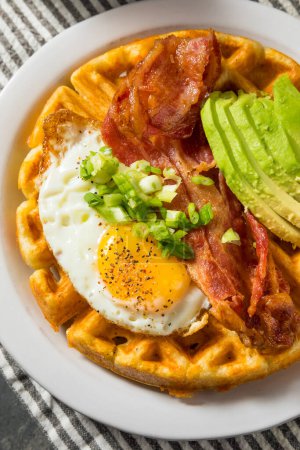 Photo for Homemade Savory Waffles with Bacon Egg and Avocados - Royalty Free Image