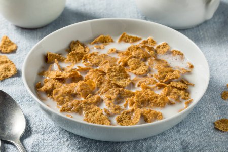 Photo for Homemade Healthy Corn Flakes with Whole Milk - Royalty Free Image
