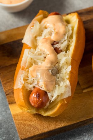 Foto de Homemade Kansas City Style Reuben Hot Dog with Sauerkraut - Imagen libre de derechos
