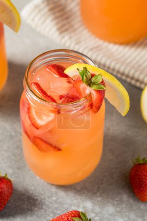 Photo for Cold Refreshing Strawberry Lemonade with Ice in a Glass - Royalty Free Image