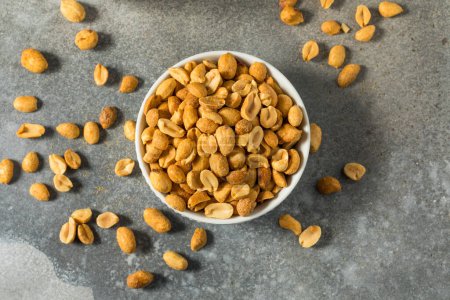 Photo for Organic Roasted and Salted Peanuts in a Bowl - Royalty Free Image