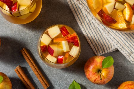Photo for Cold Refreshing Apple Cider Sangria Cocktail with Wine - Royalty Free Image