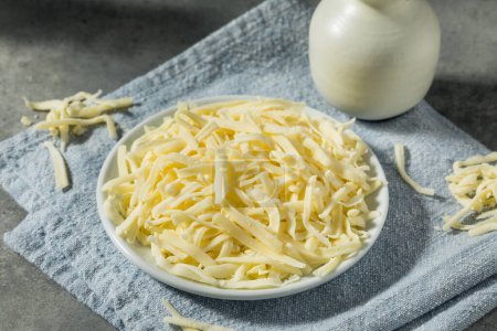 Photo for Skim Shredded Mozzarella Cheese in a Bowl - Royalty Free Image