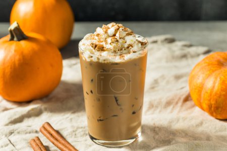 Photo for Cold Refreshing Iced Pumpkin Spice Latte with Whipped Cream - Royalty Free Image