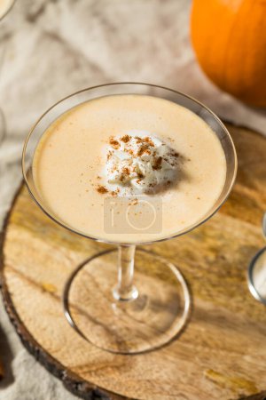 Photo for Cold Boozy Pumpkin Pie Spice Martini with Vodka - Royalty Free Image