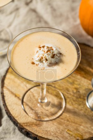 Photo for Cold Boozy Pumpkin Pie Spice Martini with Vodka - Royalty Free Image