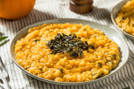 Photo for Homemade Autumn Pumpkin Risotto with Sage and Butter - Royalty Free Image