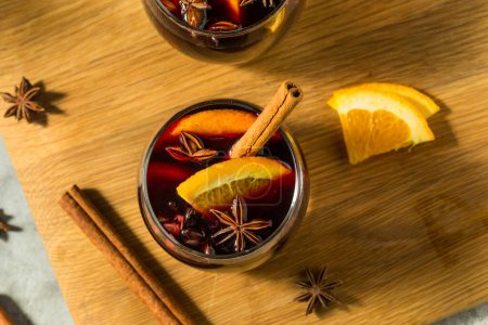 Photo for Warm Refreshing Red Mulled Wine with Cinnamon and Orange - Royalty Free Image