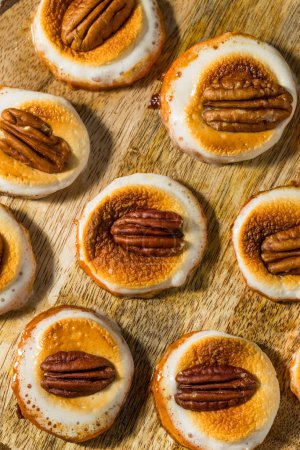 Photo for Homemade Sweet Potato Bites with Marshmallows and Pecans for Thanksgiving - Royalty Free Image