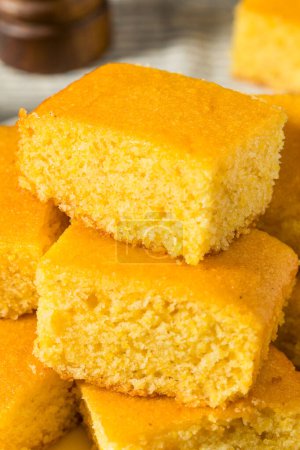 Photo for Homemade Baked American Corn Bread with Butter - Royalty Free Image