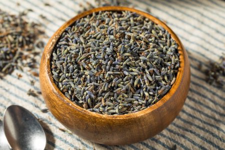 Photo for Raw Purple Organic Dry Lavender in a Bowl - Royalty Free Image