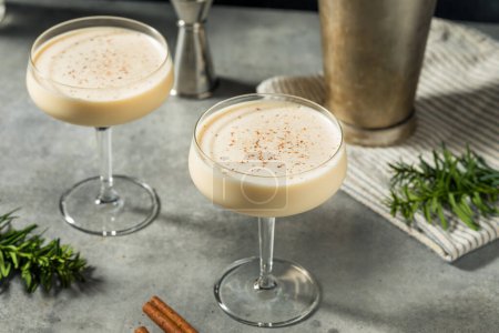 Photo for Boozy Frozen Eggnog Martini Cocktail with Brandy - Royalty Free Image