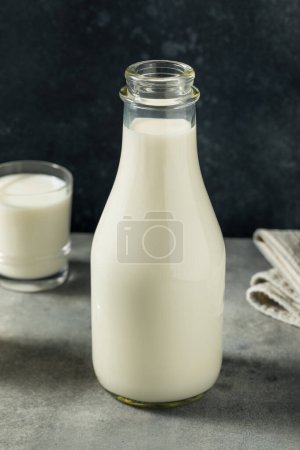 Photo for Organic Grass Fed Whole Cow Milk in a Glass - Royalty Free Image