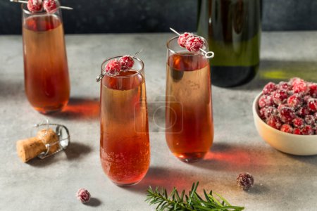 Photo for Boozy Bubbly Refreshing Cranberry Mimosa with Champagne - Royalty Free Image