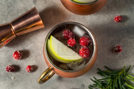 Photo for Boozy Cold Apple Cranberry Moscow Mule with Vodka - Royalty Free Image