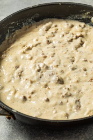 Photo for Homemade Southern Sausage Gravy for Breakfast in a Pan - Royalty Free Image