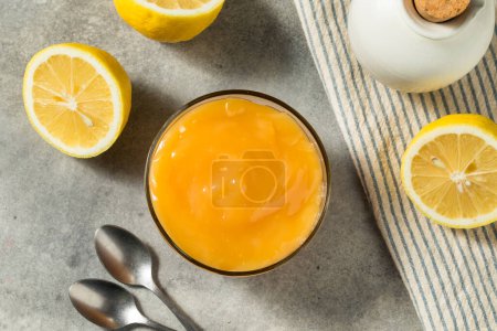 Photo for Sweet Organic Lemon Curd Spread in a Glass Jar - Royalty Free Image