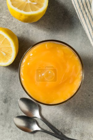 Photo for Sweet Organic Lemon Curd Spread in a Glass Jar - Royalty Free Image