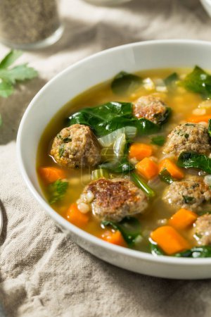 Photo for Hearty Homemade Italian Wedding Soup with Spinach and Meatballs - Royalty Free Image
