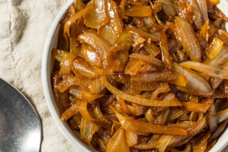 Photo for Brown Organic Caramelized Onions in a Bowl to Cook With - Royalty Free Image