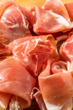 Photo for Organic Salty Parma Ham Prosciutto on a Platter - Royalty Free Image