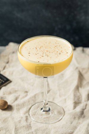 Photo for Boozy Refreshing Eggnog Rum Flip Cocktail for the Holidays - Royalty Free Image