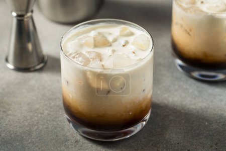 Photo for Refreshing Boozy Vodka White Russian Cocktail with Coffee - Royalty Free Image