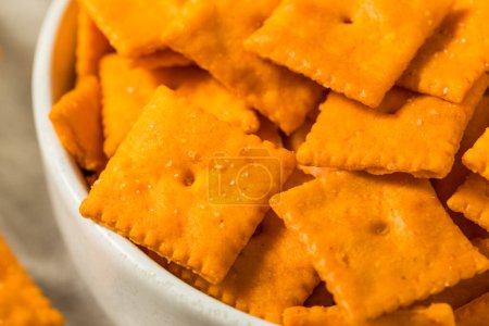 Photo for Organic Square Cheese Cracker Snacks in a Bowl - Royalty Free Image