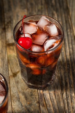 Photo for Cold Refreshing Cherry Cola with Ice in a Glass - Royalty Free Image