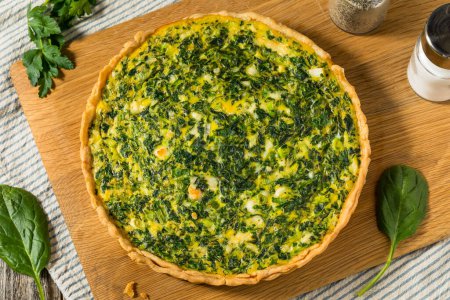 Photo for Homemade French Spinach Quiche Tart wtih Eggs and Feta - Royalty Free Image
