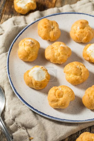 Photo for French Homemade Mini Cream Puff with whipped Filling - Royalty Free Image