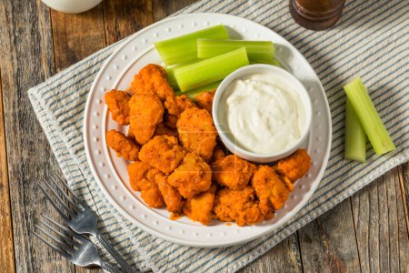 Photo for Spicy Homemade Boneless Buffalo Chicken Wings with Ranch Dressing - Royalty Free Image